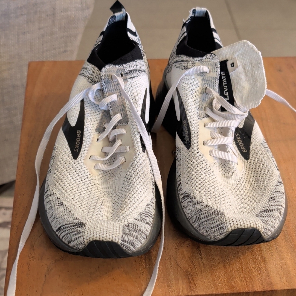 Brooks White And Black Levitate 4 Athletic Sneakers